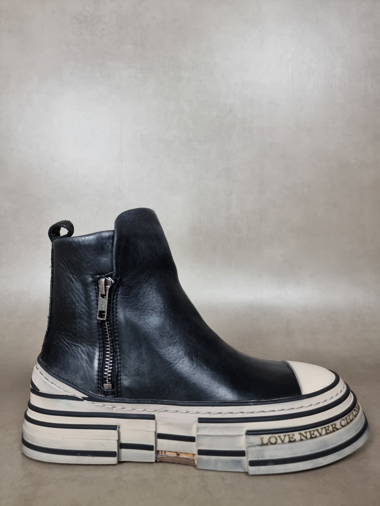 ankle boot with zip and striped bottom