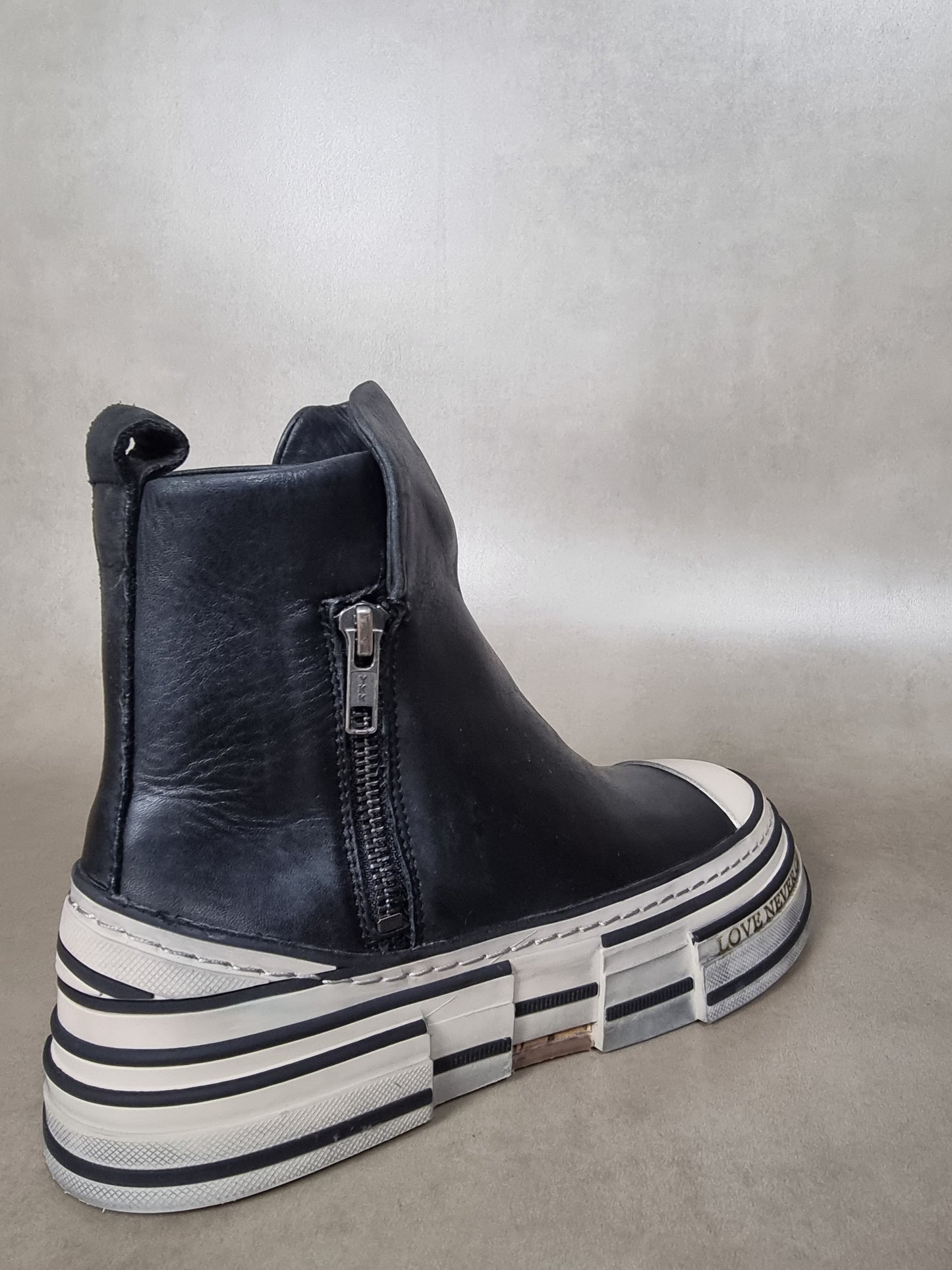 ankle boot with zip and striped bottom