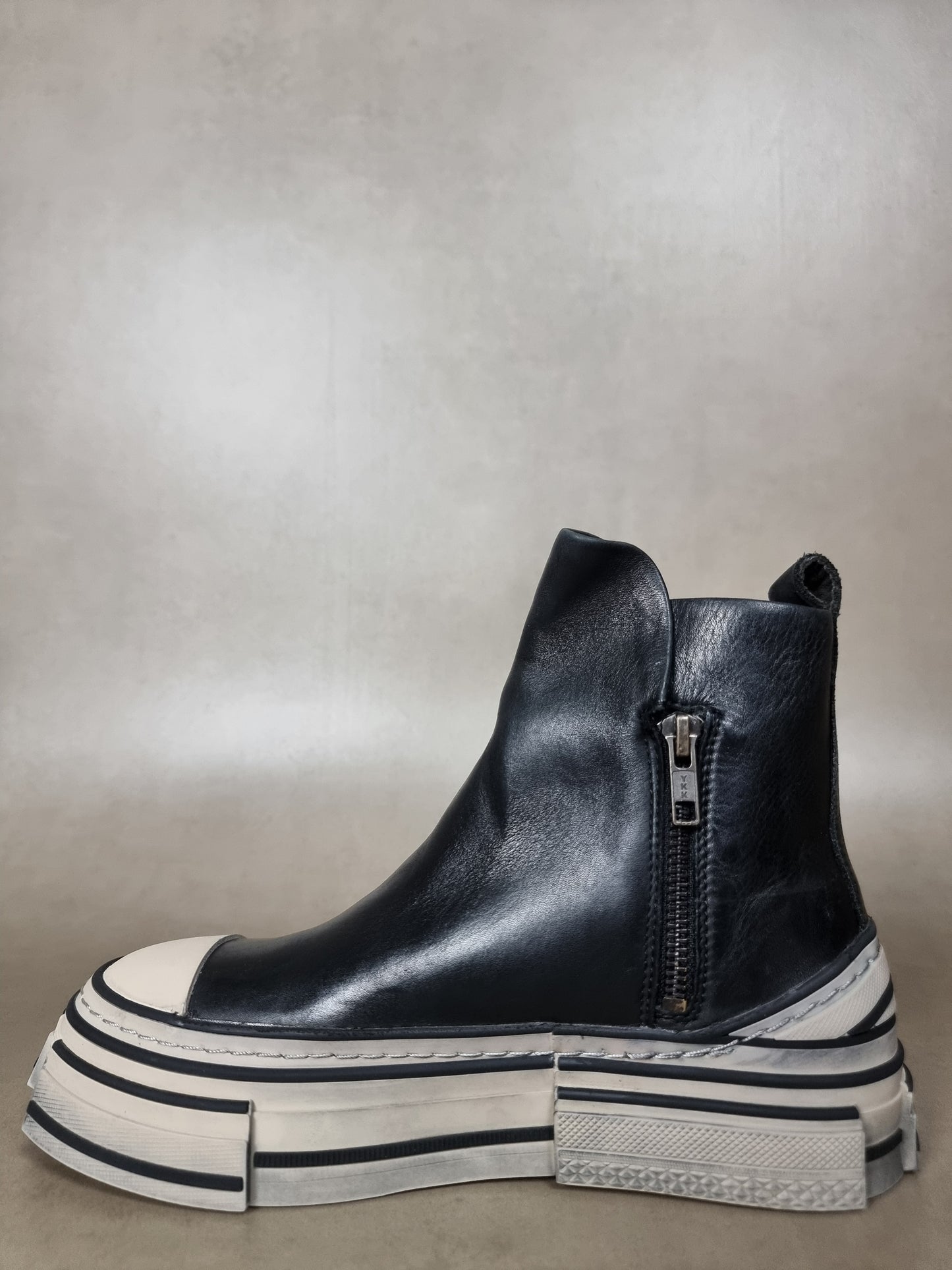 ankle boot with zip and striped bottom